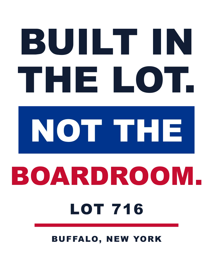 Built in the Lot graphic in navy, blue, red, and white